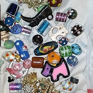 A bunch of glass and fimo dough beads